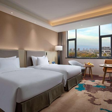 Готель Ramada Wyndham Zhengzhou Xinzheng Xinzheng  Екстер'єр фото