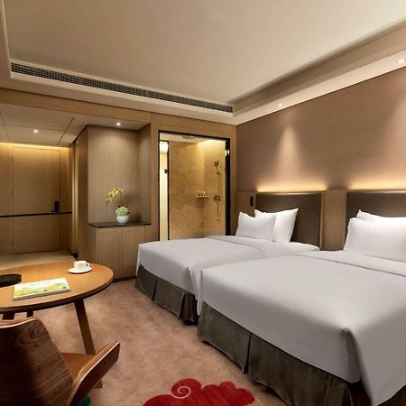 Готель Ramada Wyndham Zhengzhou Xinzheng Xinzheng  Екстер'єр фото