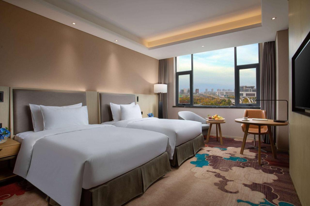 Готель Ramada Wyndham Zhengzhou Xinzheng Xinzheng  Екстер'єр фото