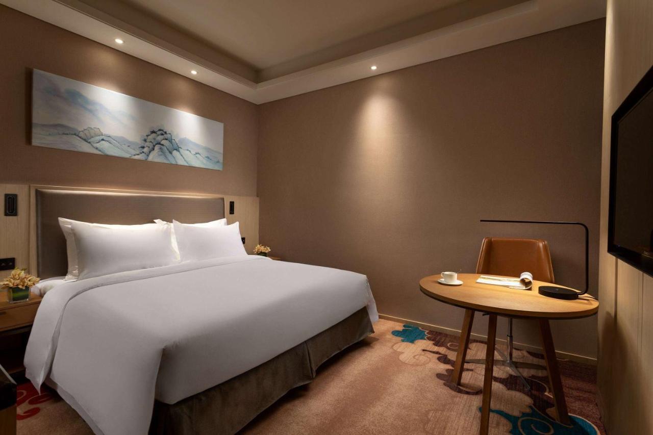 Готель Ramada Wyndham Zhengzhou Xinzheng Xinzheng  Екстер'єр фото